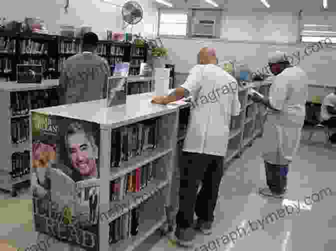 A Prison Librarian Holding A Book And Smiling Reading Behind Bars: A True Story Of Literature Law And Life As A Prison Librarian