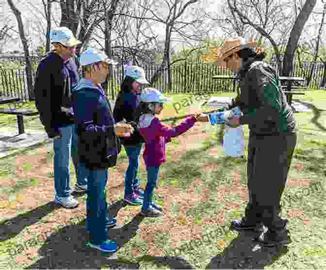 A Ranger Talking To A Family At A Picnic Area, Providing Information About The Park's History. A Greatness Of Spirit: Tales Of Extraordinary Rangers At The Heart Of California S State Park System