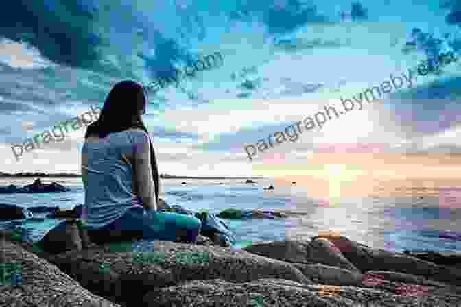 A Woman Sitting On A Rock Overlooking A Stunning Landscape, Reflecting On Her Journey Discovering Beautiful: On The Road To Somewhere