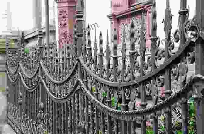 Close Up Of A Beautifully Crafted Iron Fence, Showcasing Intricate Scrollwork And Floral Motifs. Ornamental Ironwork: Over 670 Illustrations (Dover Pictorial Archive)