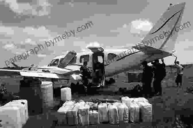 Jack Reed, Standing By A Small Plane Used For Drug Smuggling Buccaneer: The Provocative Odyssey Of Jack Reed Adventurer Drug Smuggler And Pilot Extraordinaire