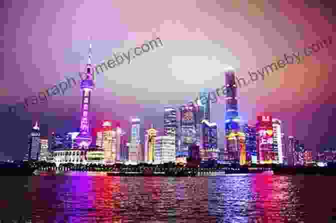 Night View Of Shanghai's Pudong Skyline, Showcasing The City's Vibrant Nightlife And Illuminated Skyscrapers Destination Shanghai Paul French