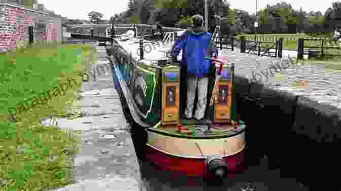 The Couple Navigating Their Floating Home Through A Narrow Lock On A Canal In France. Just Passing Through: A Nomadic Life Afloat In France